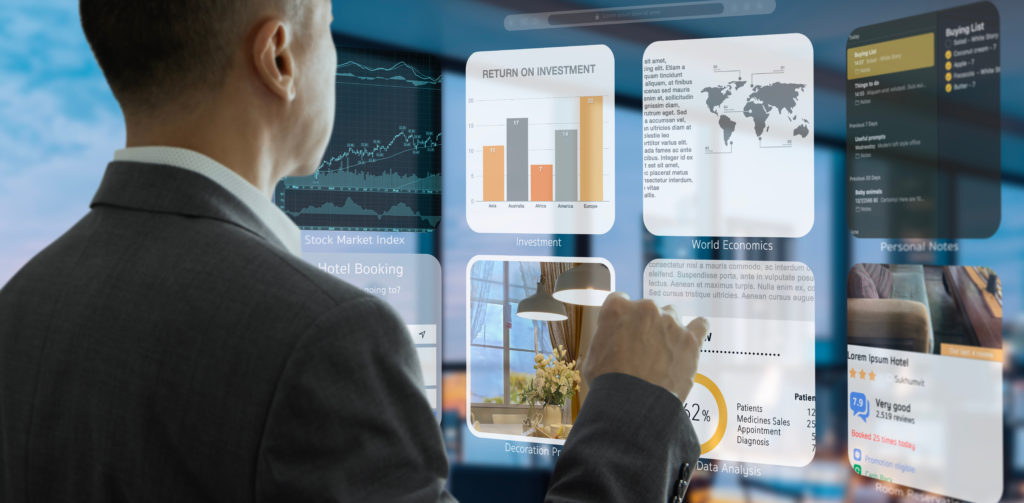 Businessman in the office interacting to augmented reality or virtual touch screen for internet browsing